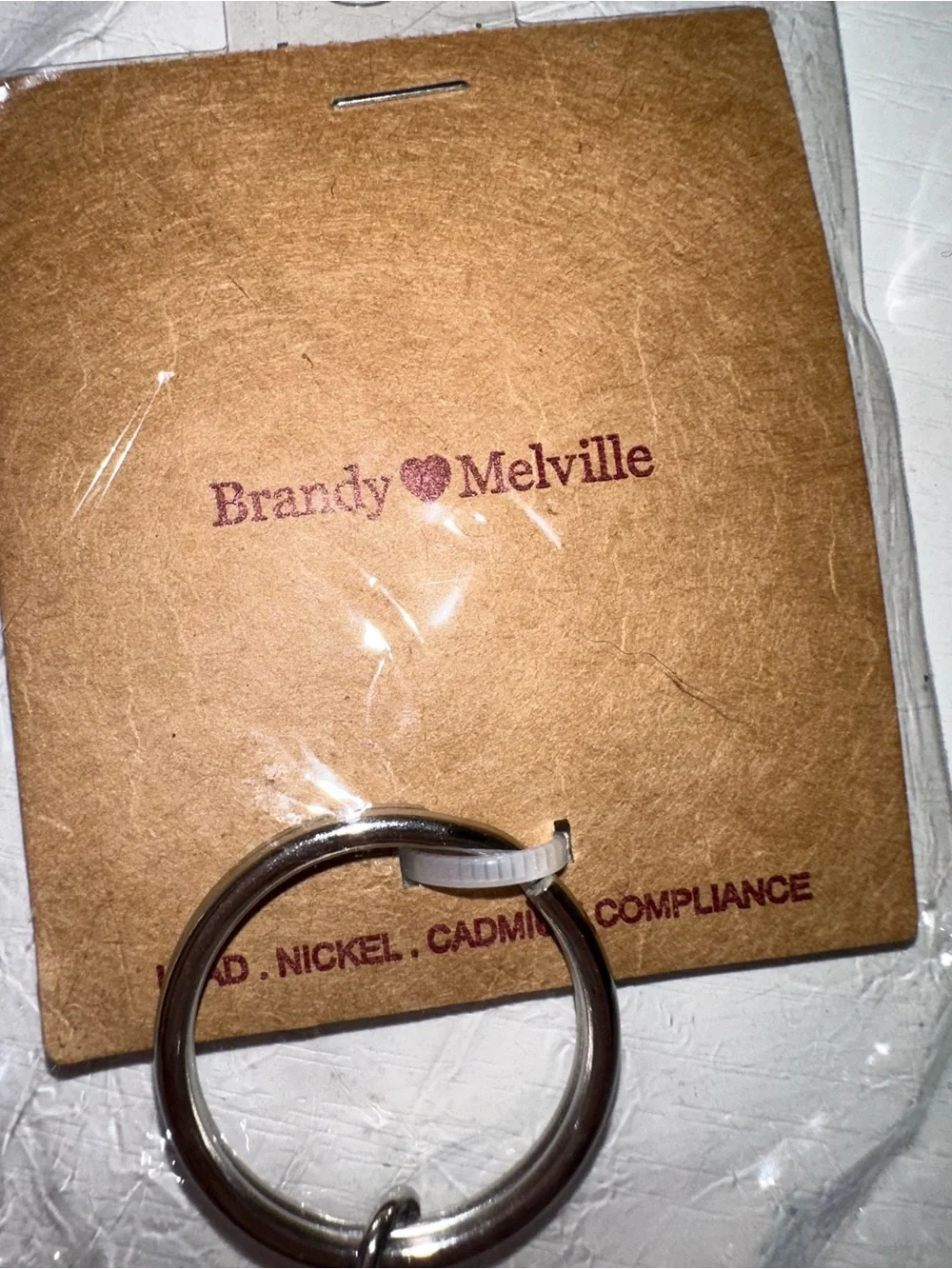 Brandy Melville Smiley Face Keychain